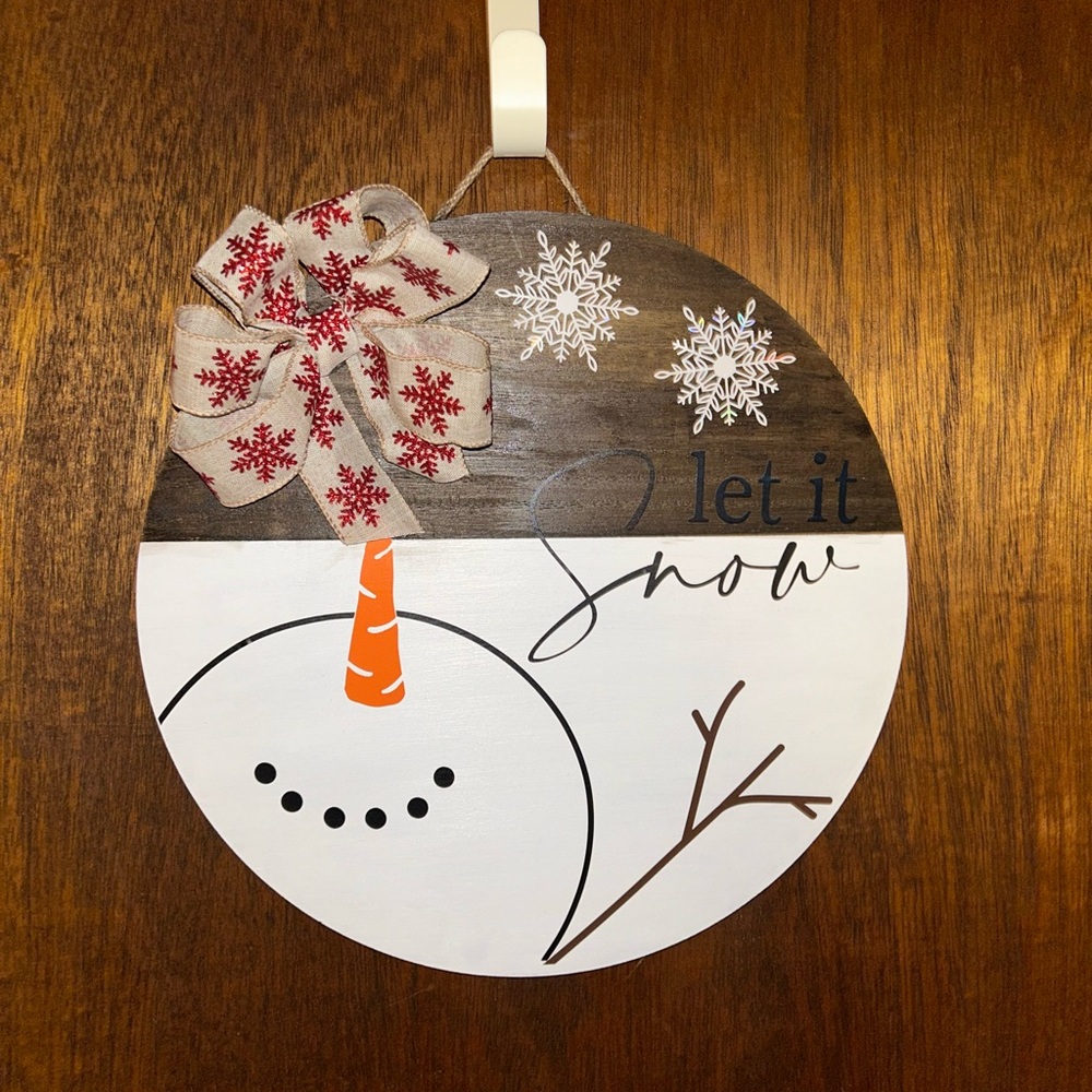 Festive Snowman Wall Decor with Red Bow